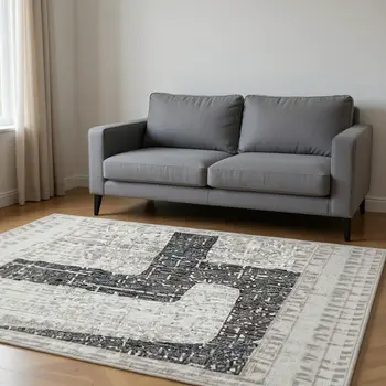 5' X 8' Gray And Ivory Abstract Washable Area Rug With UV Protection