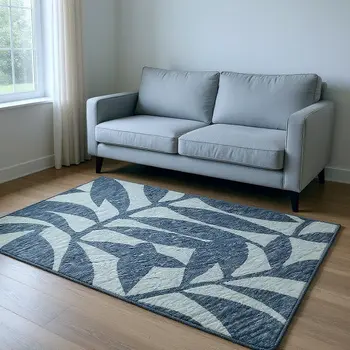 5' X 8' Blue And Ivory Botanical Leaves Washable Area Rug With UV Protection