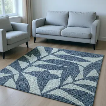 9' X 12' Blue And Ivory Botanical Leaves Washable Area Rug With UV Protection