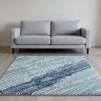 10' X 14' Blue And Ivory Botanical Leaves Washable Area Rug With UV Protection