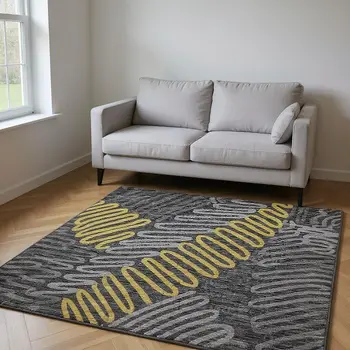 5' X 8' Gray Gold And Black Botanical Leaves Washable Area Rug With UV Protection