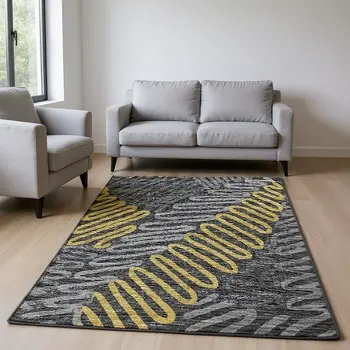 9' X 12' Gray Gold And Black Botanical Leaves Washable Area Rug With UV Protection