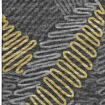 9' X 12' Gray Gold And Black Botanical Leaves Washable Area Rug With UV Protection