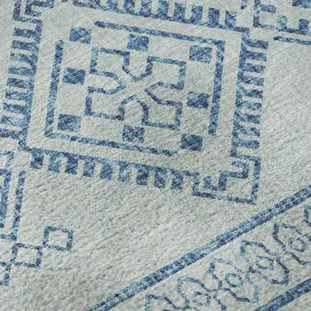 8' X 10' Blue And Ivory Tribal Washable Area Rug With UV Protection