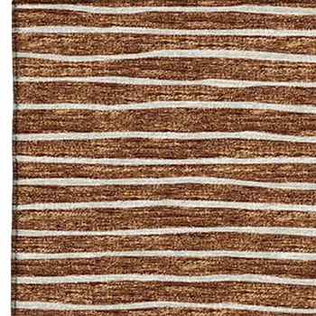 5' X 8' Rust And Ivory Striped Washable Area Rug With UV Protection