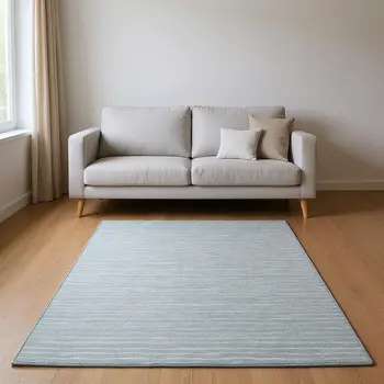 5' X 8' Sky Blue And Ivory Striped Washable Area Rug With UV Protection