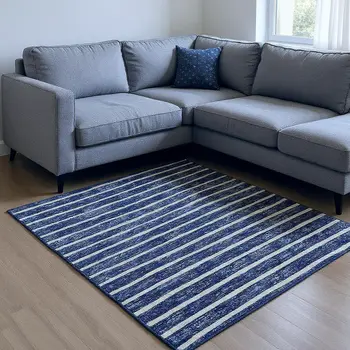 5' X 8' Navy Blue And Ivory Striped Washable Area Rug With UV Protection