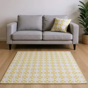 5' X 8' Gold And Ivory Geometric Washable Area Rug With UV Protection