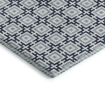 10' X 14' Navy Blue And Ivory Geometric Washable Area Rug With UV Protection