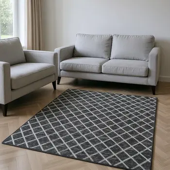 8' X 10' Black And Ivory Geometric Washable Area Rug With UV Protection