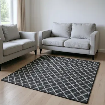 10' X 14' Black And Ivory Geometric Washable Area Rug With UV Protection
