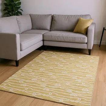8' X 10' Gold And Ivory Nautical Washable Area Rug With UV Protection