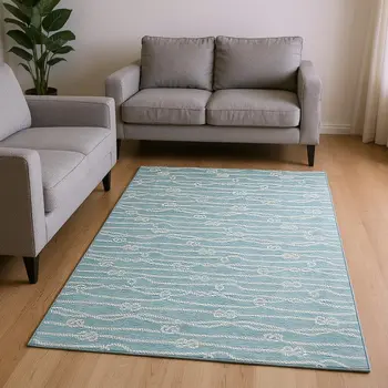 9' X 12' Teal Blue And Ivory Nautical Washable Area Rug With UV Protection