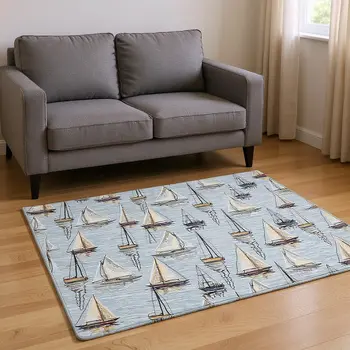 5' X 8' Sky Blue Gold And Ivory Nautical Washable Area Rug With UV Protection