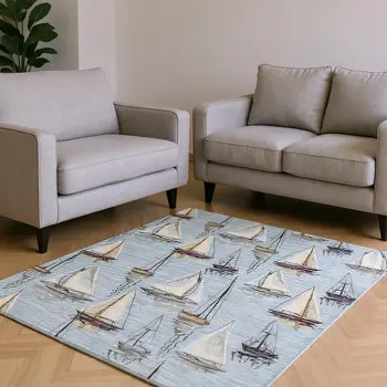 8' X 10' Sky Blue Gold And Ivory Nautical Washable Area Rug With UV Protection