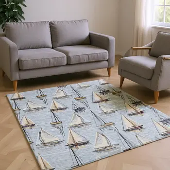 10' X 14' Sky Blue Gold And Ivory Nautical Washable Area Rug With UV Protection