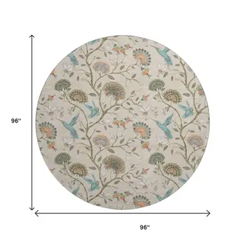 8' Beige Blue And Peach Geometric Washable Round Rug With UV Protection