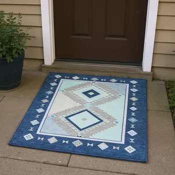 3' X 5' Blue And Ivory Geometric Washable Area Rug With UV Protection