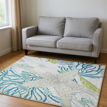 5' X 8' Aqua Ivory And Green Geometric Washable Area Rug With UV Protection