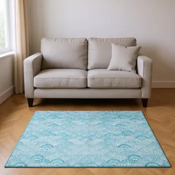 5' X 8' Aqua And Ivory Geometric Washable Area Rug With UV Protection