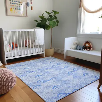 3' X 5' Blue And Ivory Geometric Washable Area Rug With UV Protection