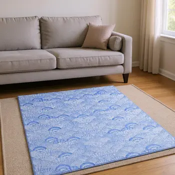5' X 8' Blue And Ivory Geometric Washable Area Rug With UV Protection