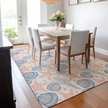 5' X 8' Peach Ivory And Navy Blue Geometric Washable Area Rug With UV Protection