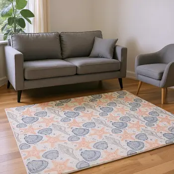 8' X 10' Peach Ivory And Navy Blue Geometric Washable Area Rug With UV Protection