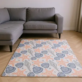 10' X 14' Peach Ivory And Navy Blue Geometric Washable Area Rug With UV Protection