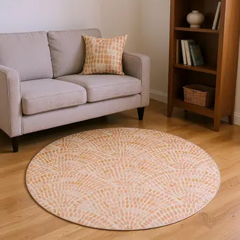 8' Peach And Ivory Geometric Washable Round Rug With UV Protection