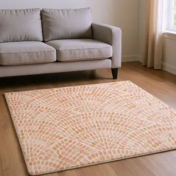 8' X 10' Peach And Ivory Geometric Washable Area Rug With UV Protection