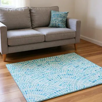 5' X 8' Aqua And Ivory Geometric Washable Area Rug With UV Protection