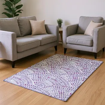 5' X 8' Purple And Ivory Geometric Washable Area Rug With UV Protection