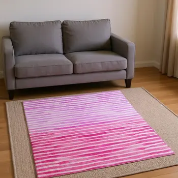 5' X 8' Pink Purple And Ivory Geometric Washable Area Rug With UV Protection