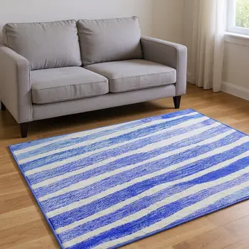 9' X 12' Blue And Ivory Geometric Washable Area Rug With UV Protection