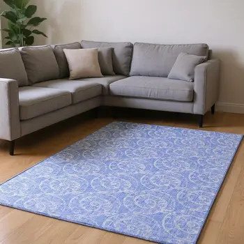 8' X 10' Blue And Ivory Geometric Washable Area Rug With UV Protection