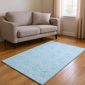 5' X 8' Aqua And Ivory Geometric Washable Area Rug With UV Protection