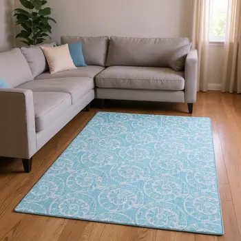 10' X 14' Aqua And Ivory Geometric Washable Area Rug With UV Protection