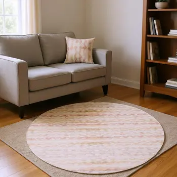 8' Peach Ivory And Beige Geometric Washable Round Rug With UV Protection