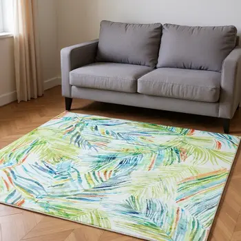 5' X 8' Rainbow And Ivory Geometric Washable Area Rug With UV Protection