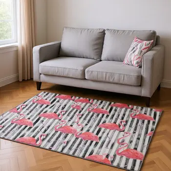 5' X 8' Pink Black And White Geometric Washable Area Rug With UV Protection