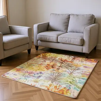 5' X 8' Rainbow And Ivory Geometric Washable Area Rug With UV Protection