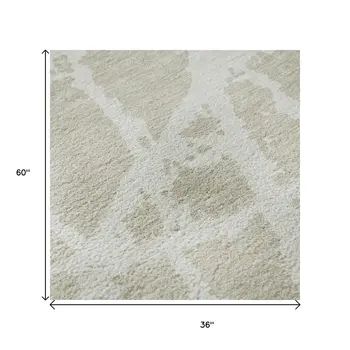 3' X 5' Beige And Ivory Abstract Washable Area Rug With UV Protection