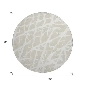 8' Beige And Ivory Abstract Washable Round Rug With UV Protection