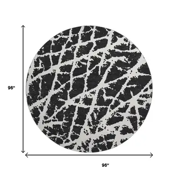 8' Black And Ivory Abstract Washable Round Rug With UV Protection