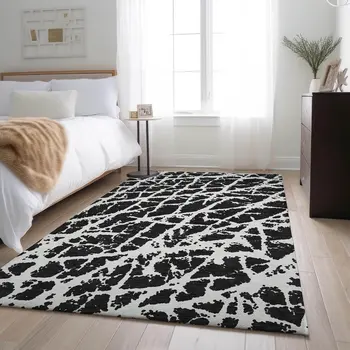 8' X 10' Black And Ivory Abstract Washable Area Rug With UV Protection