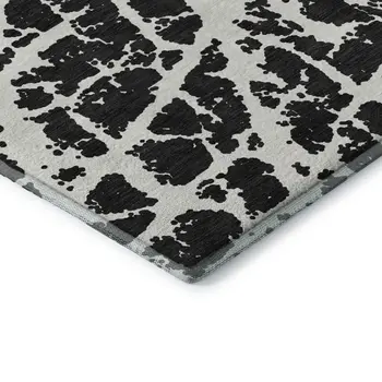 8' X 10' Black And Ivory Abstract Washable Area Rug With UV Protection