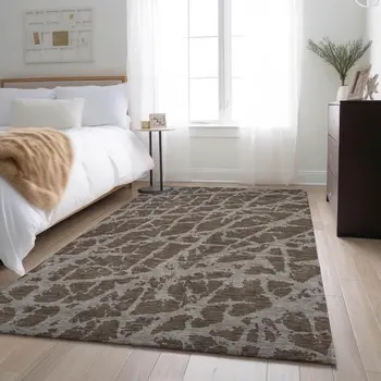 10' X 14' Brown And Ivory Abstract Washable Area Rug With UV Protection