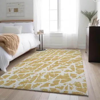 8' X 10' Gold And Ivory Abstract Washable Area Rug With UV Protection