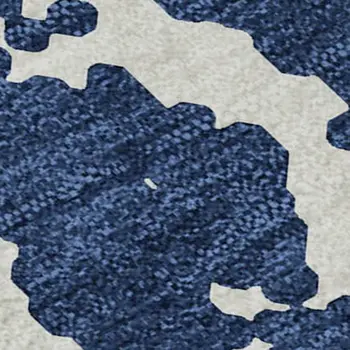 5' X 8' Navy Blue And Ivory Abstract Washable Area Rug With UV Protection